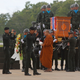 The body of Saman Gunan is carried during a repatriation and religious rites ceremony at Chiang Rai Airport in Mae Sai, Chiang Rai province, in northern Thailand Friday, July 6, 2018.